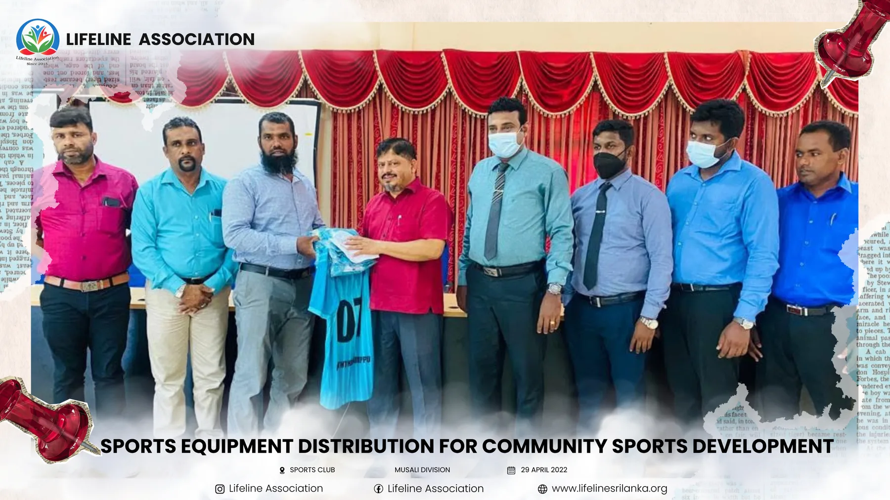 Sports clothing being handed to a community representative