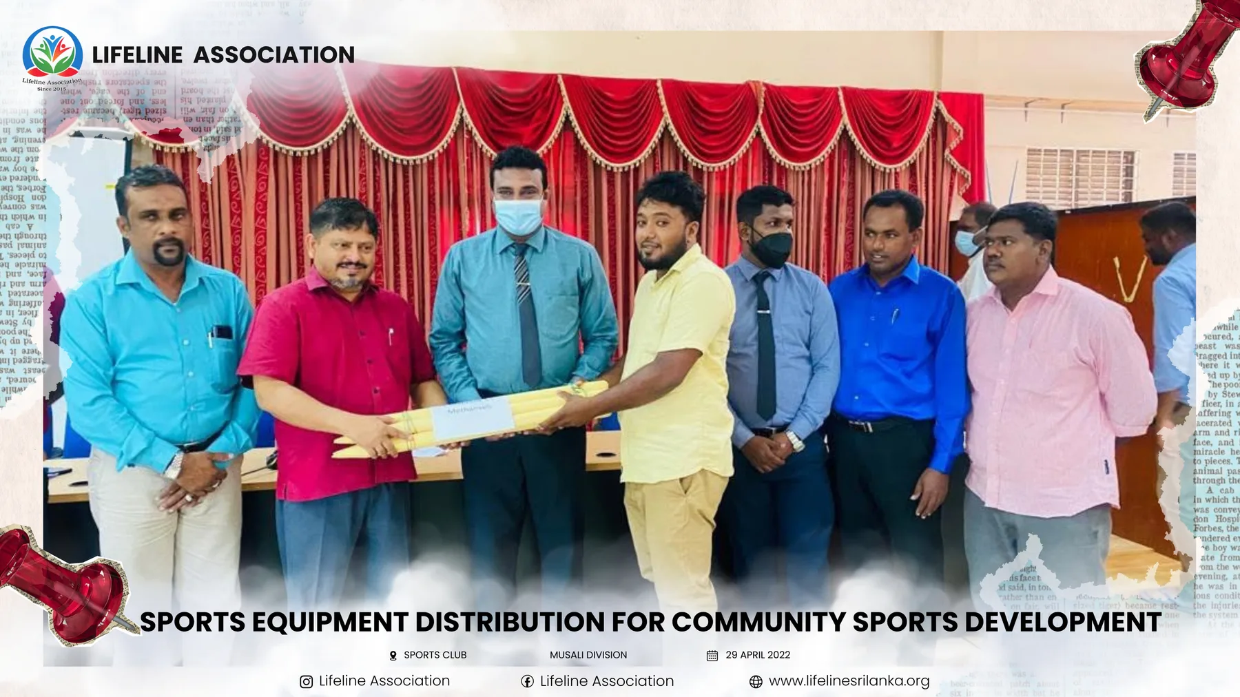 A cricket bat being presented during the sports equipment distribution