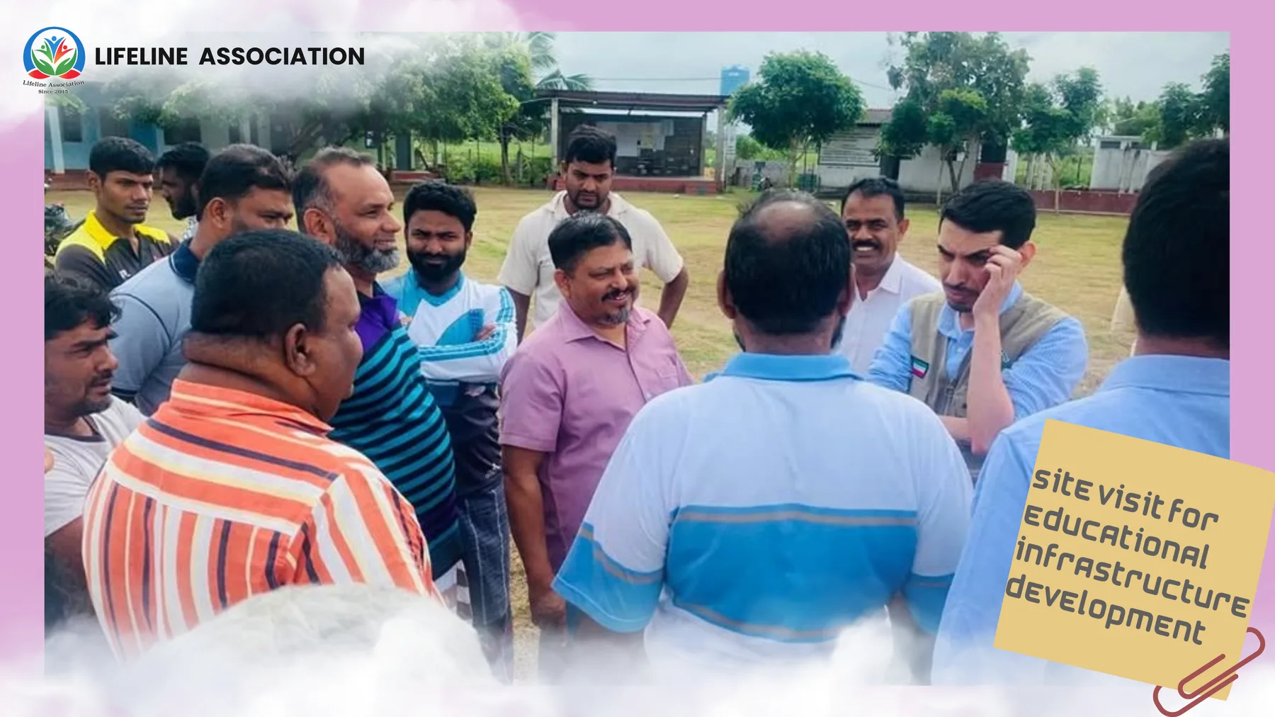 Community members and representatives meeting beside the school