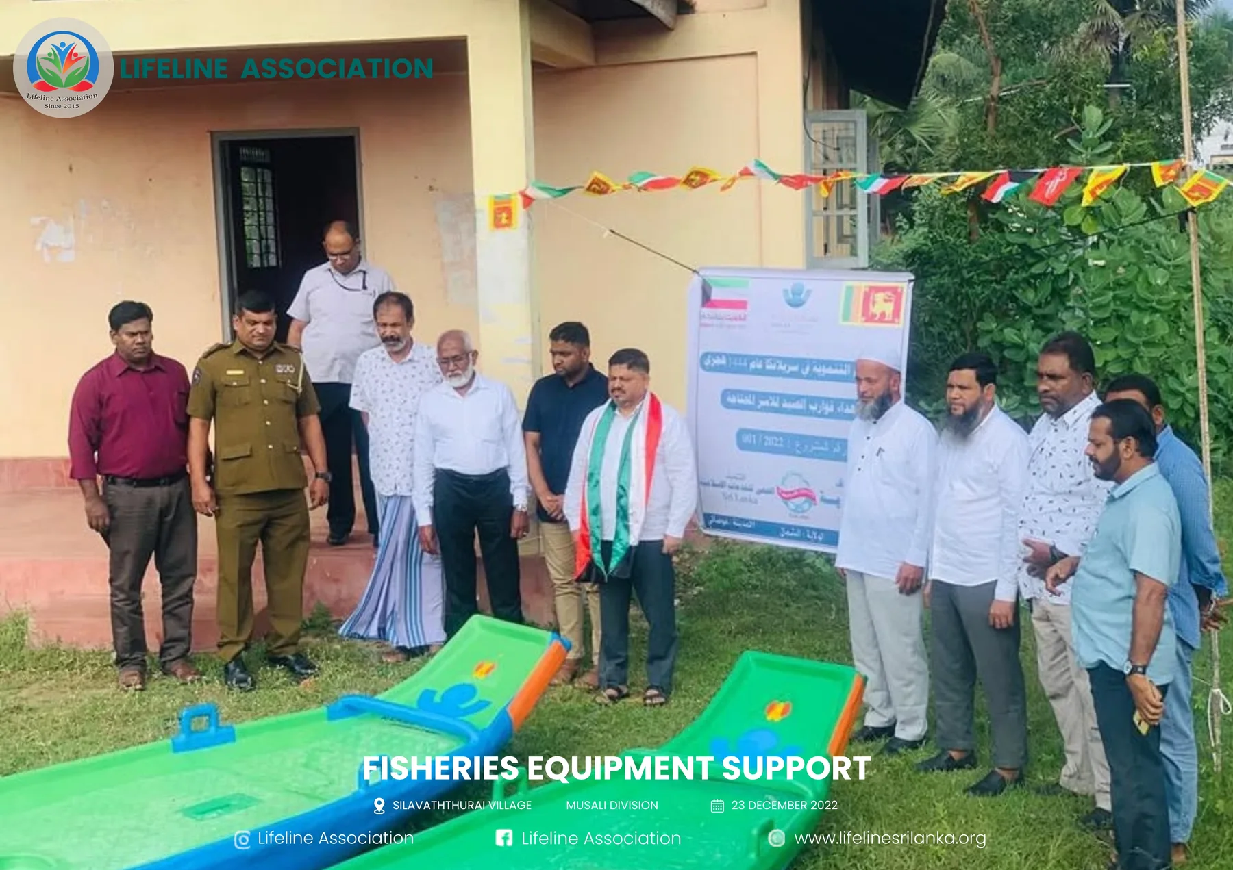 Representatives standing beside the distributed fishing equipment