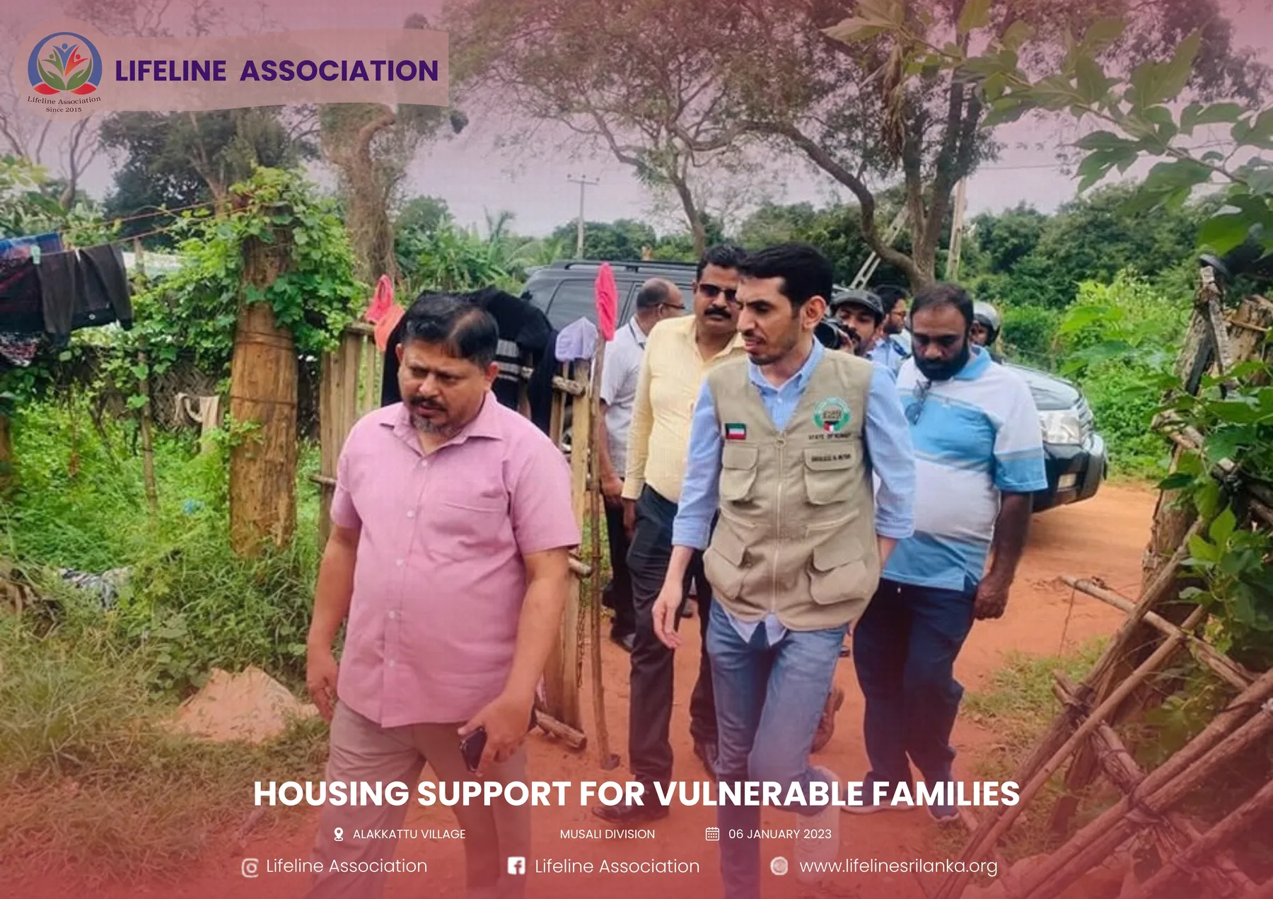 Representatives walking through the residential area during the visit