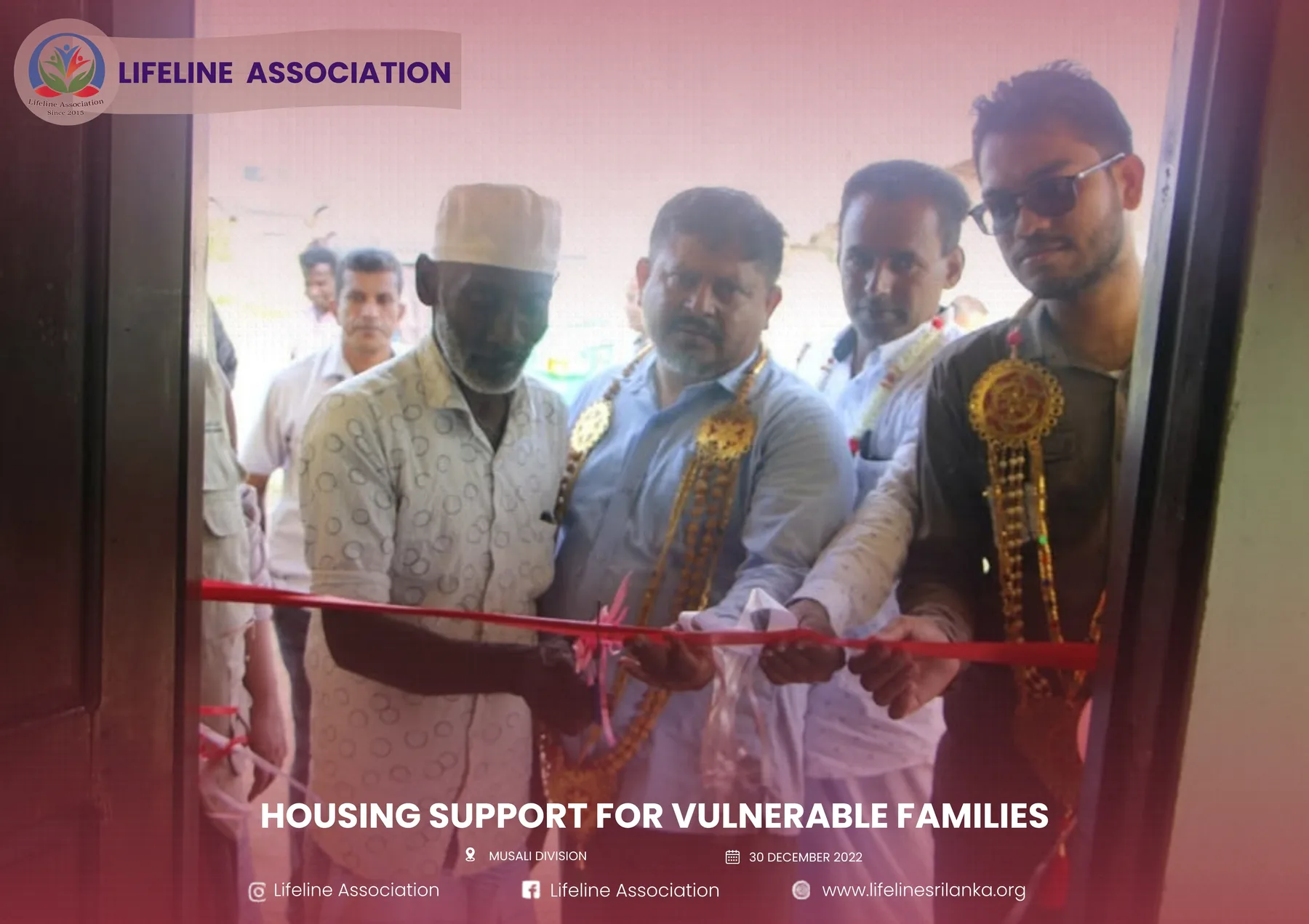 A ribbon being cut at the entrance to the completed home