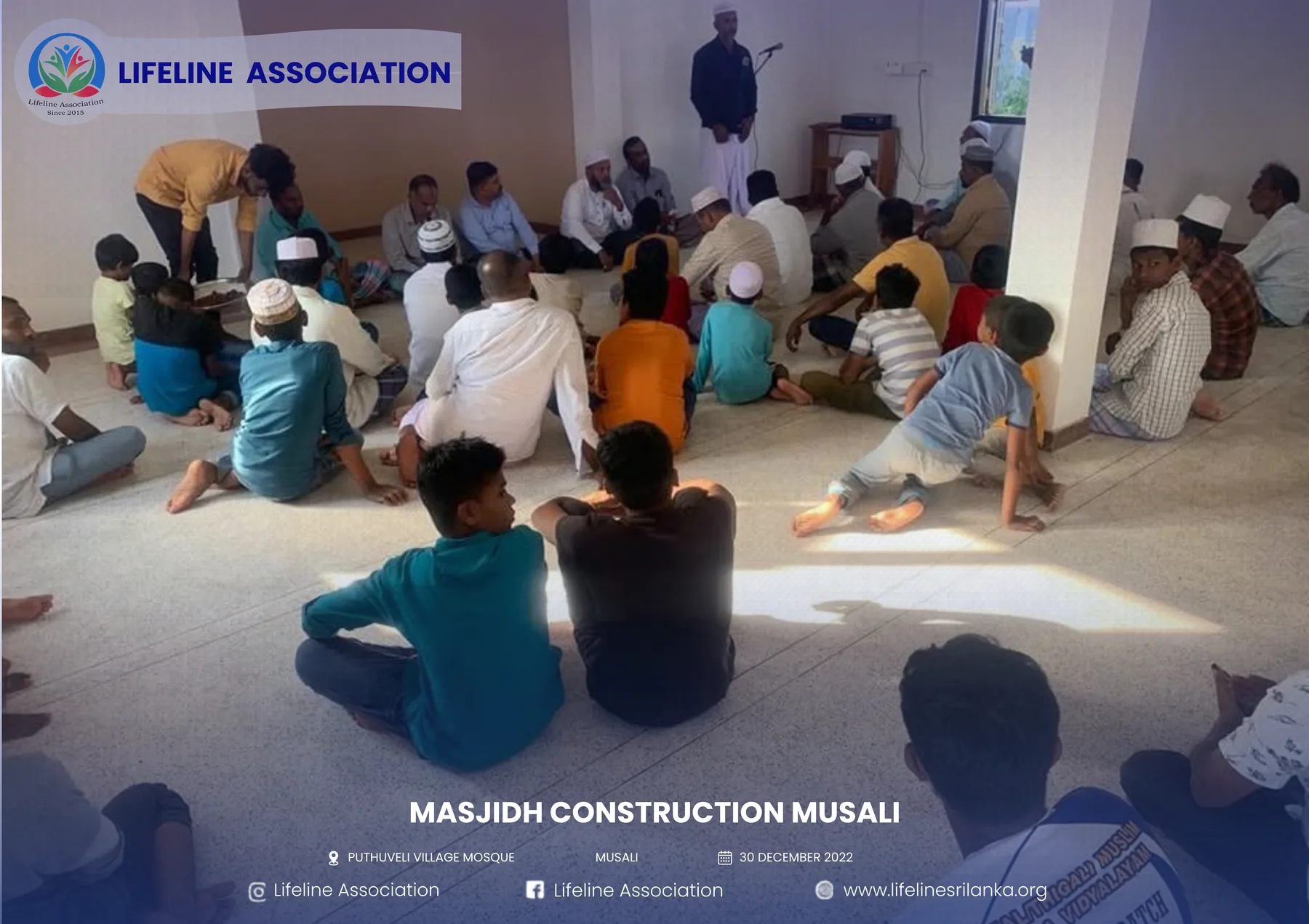 Community members seated inside the completed masjid