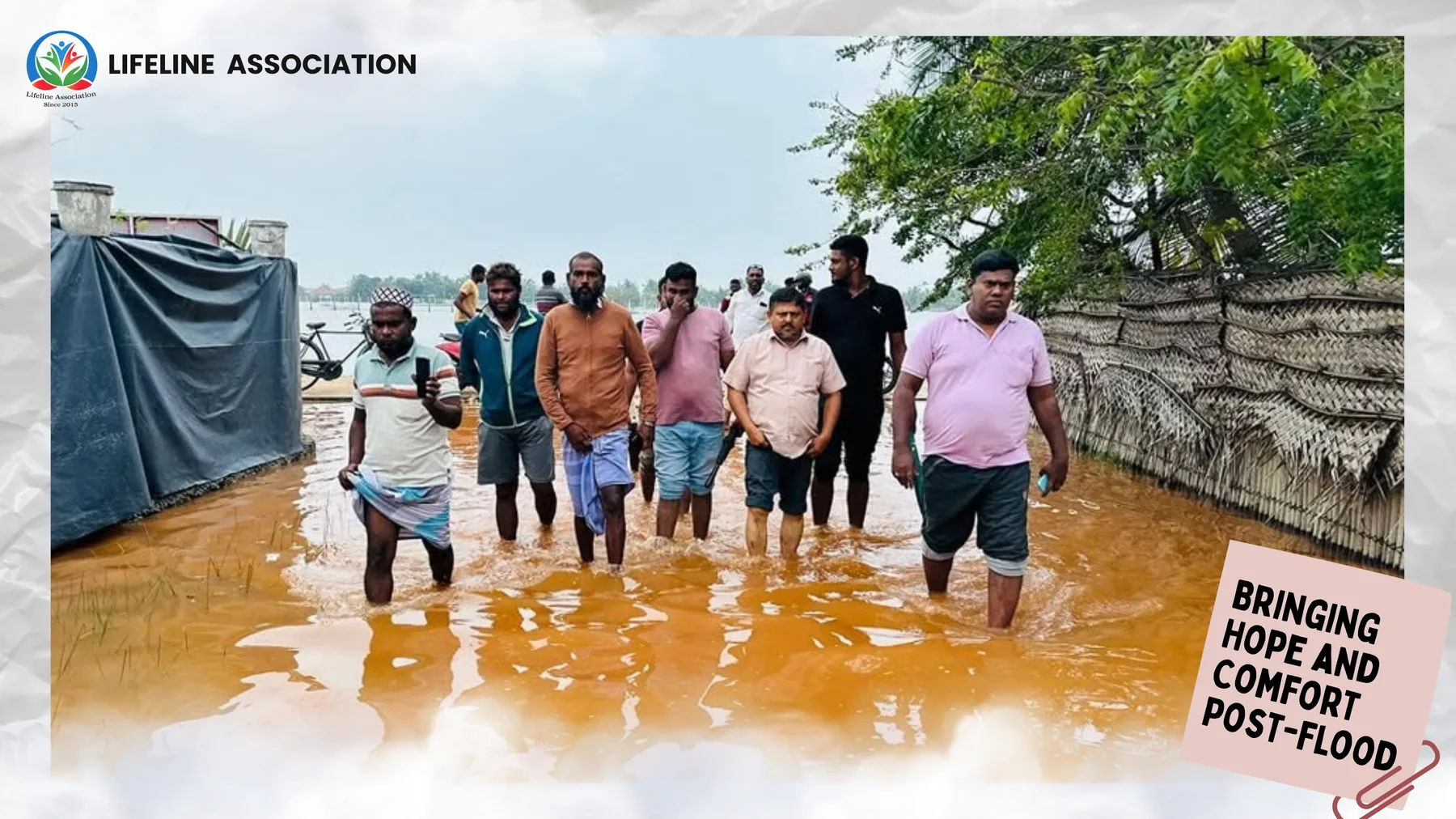 Representatives walking through waterlogged streets during the assessment