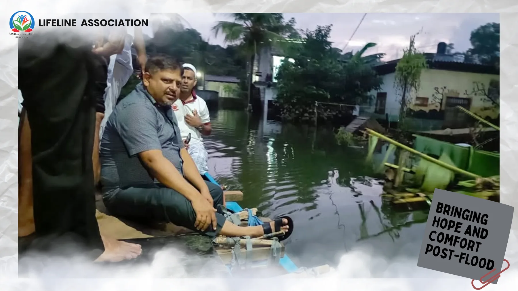 A flooded residential area viewed from a small boat