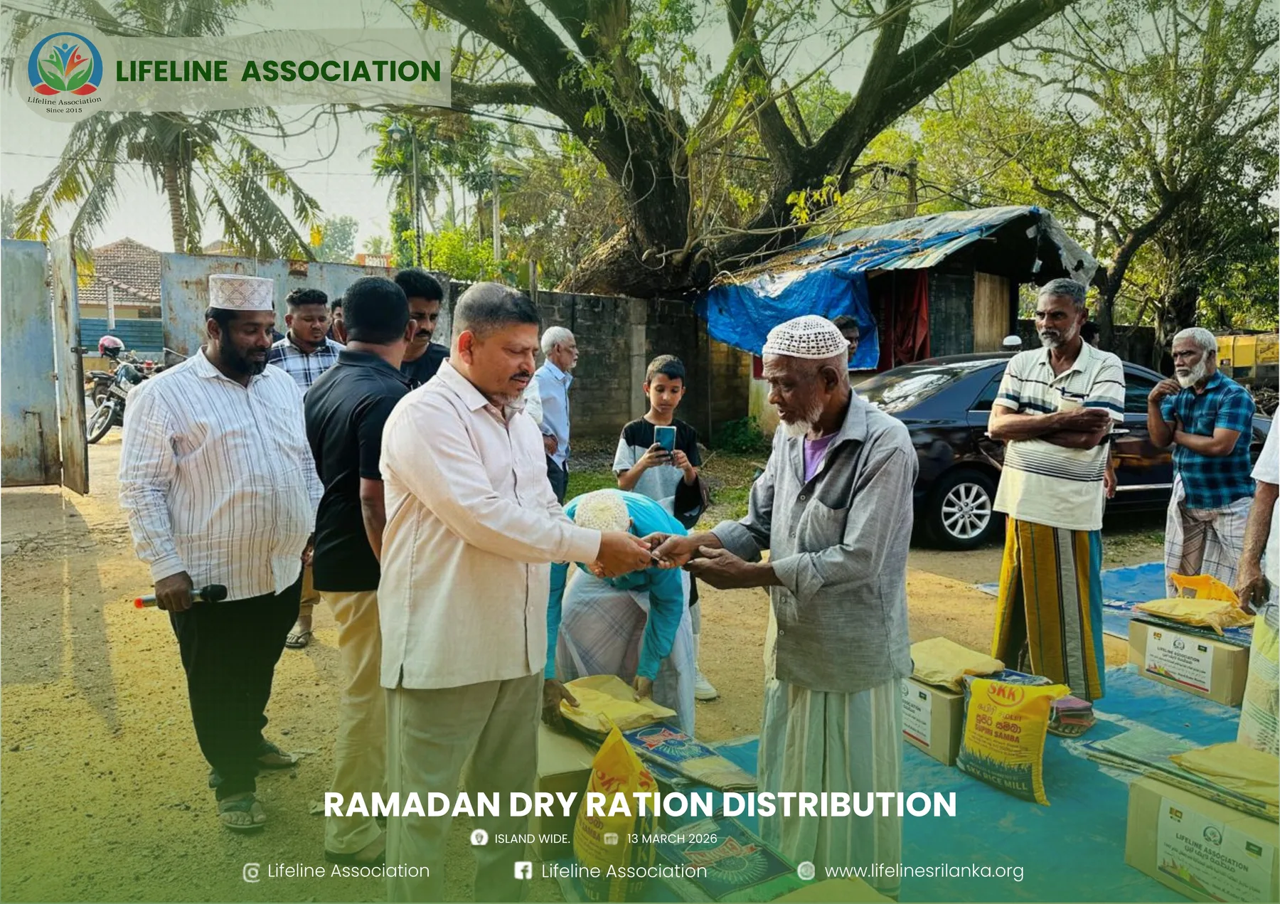 A community member receiving a dry-ration pack from Lifeline volunteers