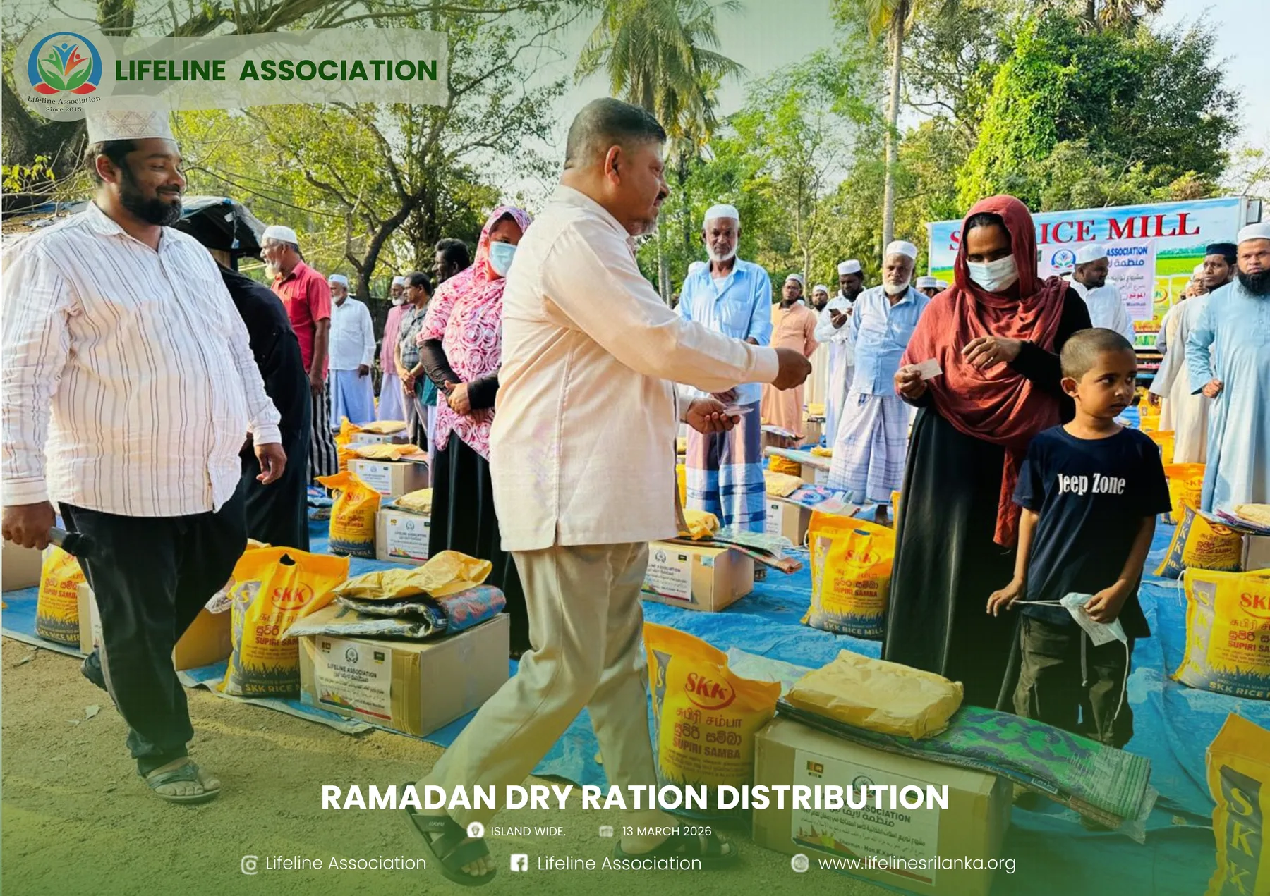 Lifeline volunteers handing dry-ration packs to community members during Ramadan